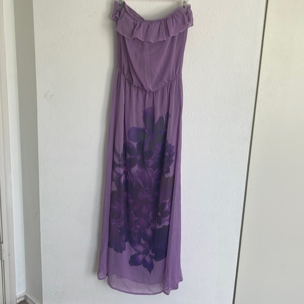 Purple strapless dress with flower on half bottom. Size medium.